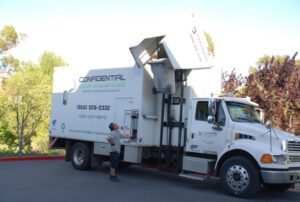 Diesel-powered truck shredded barrels full of paper